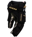 Guanti da hockey CCM Tacks AS-V PRO black/gold Junior