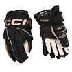 Guanti da hockey CCM Tacks XF 80 Black/Gold Junior 10 pollici